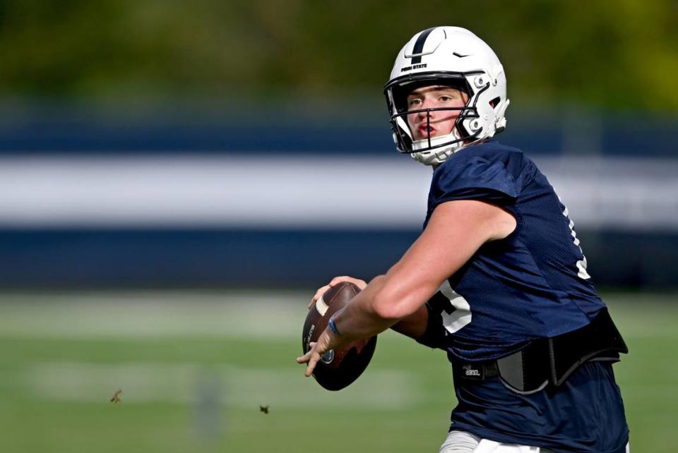 Penn State quarterback Drew Allar makes a pass as he is pressured during practice on Wednesday, Aug. 30, 2023.  