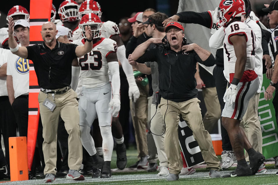 Georgia head coach Kirby Smart yells to the referee after a play during the second half of the Southeastern Conference championship NCAA college football game against Alabama in Atlanta, Saturday, Dec. 2, 2023. (AP Photo/John Bazemore)