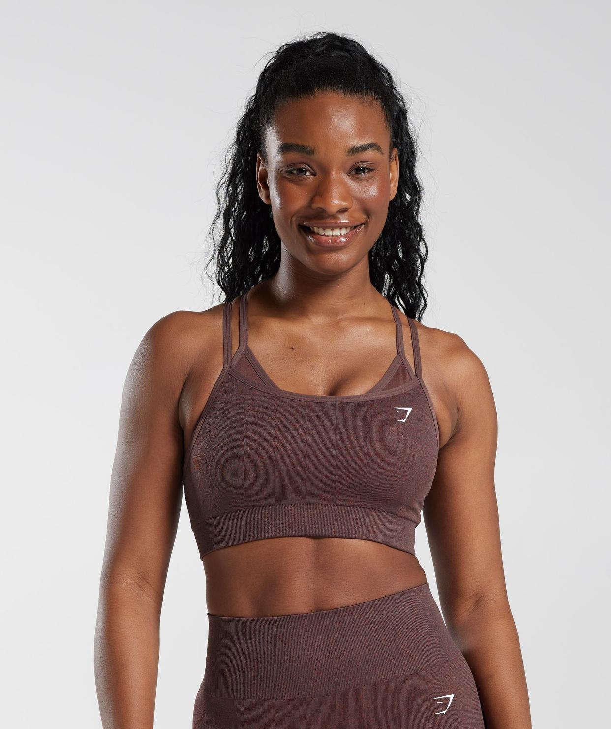 <p><a href="https://go.redirectingat.com?id=74968X1596630&url=https%3A%2F%2Fus.shop.gymshark.com%2Fproducts%2Fgymshark-adapt-fleck-seamless-sports-bra-chocolate-brown-ss23&sref=https%3A%2F%2Fwww.harpersbazaar.com%2Ffashion%2Ftrends%2Fg44400493%2Fbest-sports-bras-for-large-breasts%2F" rel="nofollow noopener" target="_blank" data-ylk="slk:Shop Now;elm:context_link;itc:0;sec:content-canvas" class="link rapid-noclick-resp">Shop Now</a></p><p>Adapt Fleck Seamless Sports Bra</p><p>$22.80</p><p>gymshark.com</p>