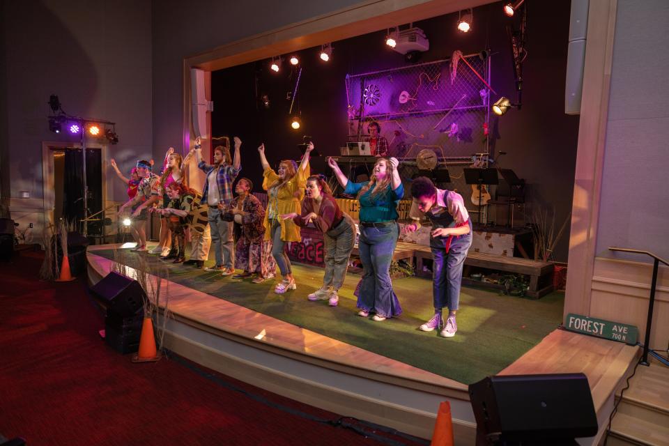 The cast rehearses for Art 4's production of "Godspell" that opens March 17 and continues through March 26 at the St. Joseph County Public Library in downtown South Bend.