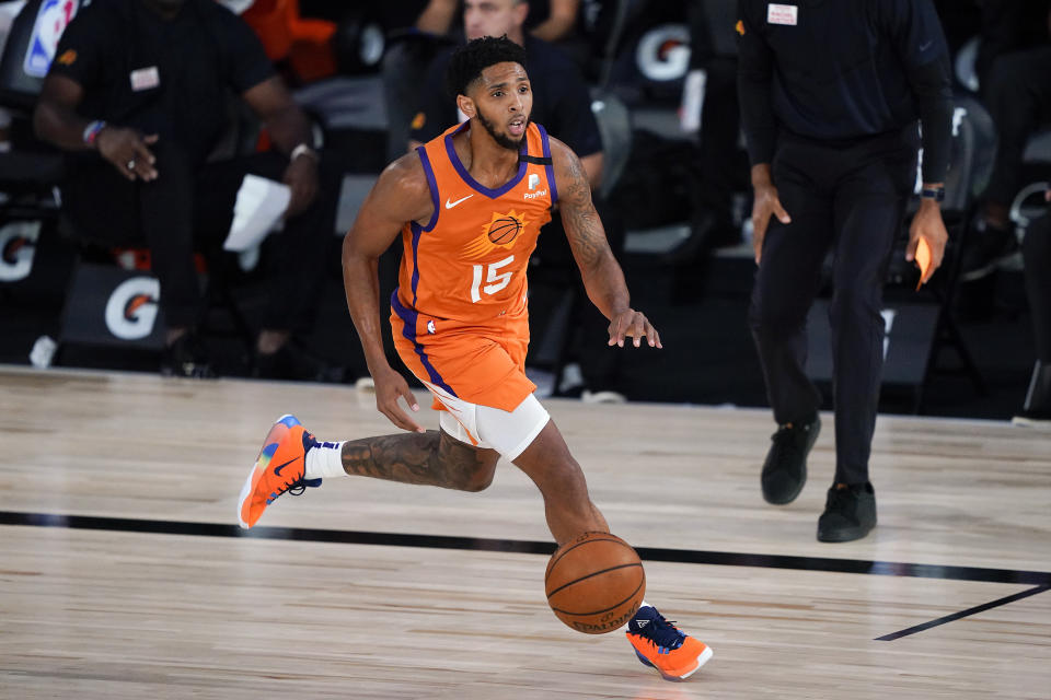 Phoenix Suns guard Cameron Payne (15) brings the ball up court against the Dallas Mavericks during the second half of an NBA basketball game Sunday, Aug. 2, 2020, in Lake Buena Vista, Fla. (AP Photo/Ashley Landis, Pool)