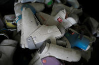 <p>Ski boots lie at an abandoned ski rental shop in front of the Alps Ski Resort located near the demilitarized zone separating the two Koreas in Goseong, South Korea, Jan. 17, 2018. (Photo: Kim Hong-Ji/Reuters) </p>