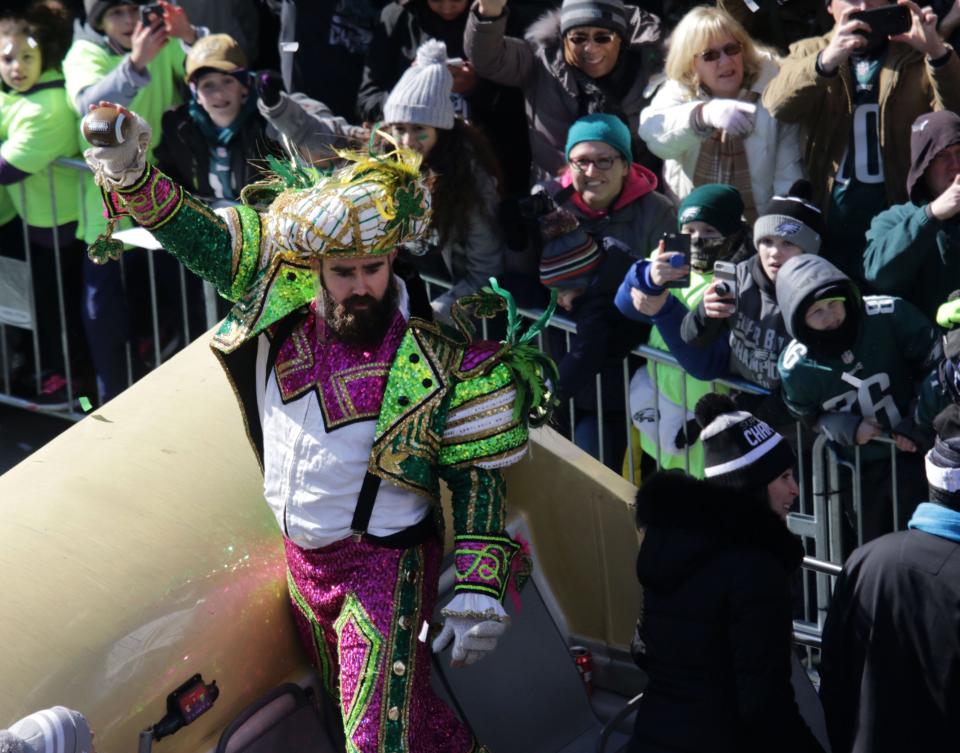 Eagles Jason Kelce dressed in a Mummers outfit while riding in Philadelphia Eagles parade celebrating their Super Bowl LII victory on Thursday.