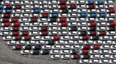 New Ford vehicles are seen at a parking lot of the Ford factory in Sao Bernardo do Campo February 12, 2015. REUTERS/Paulo Whitaker