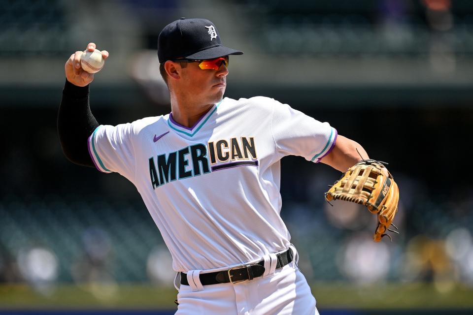 Tigers prospect Spencer Torkelson throws as he warms up before the game against the National League Futures Team at Coors Field on July 11, 2021 in Denver.