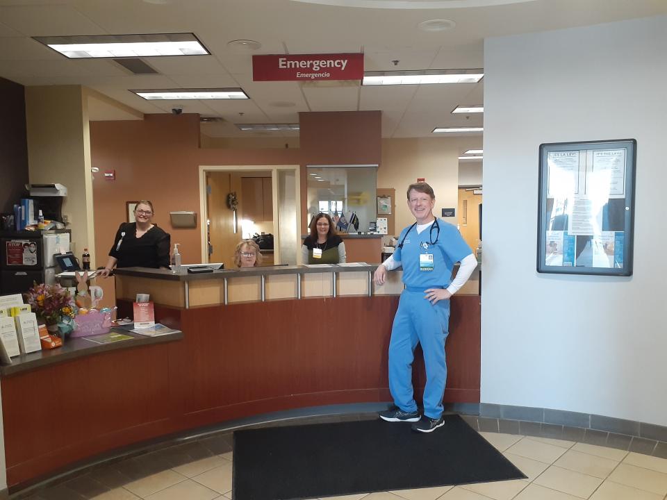 Critical care physician Scott Ries stands at the front desk of the emergency Room at Ascension St. Vincent Randolph Hospital in Winchester. The hospital, with a lot of help from across the state, helped bring Randolph County through an F3 tornado earlier this month without loss of life.