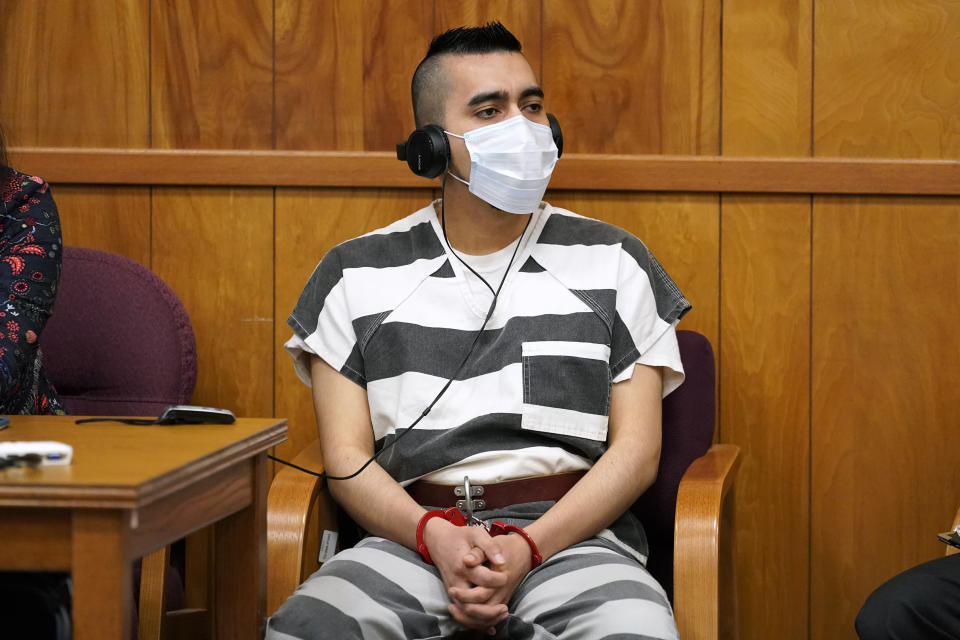 Cristhian Bahena Rivera listens to proceedings during his sentencing, Monday, Aug. 30, 2021, at the Poweshiek County Courthouse in Montezuma, Iowa. Rivera was sentenced to life in prison for the stabbing death of college student Mollie Tibbetts, who was abducted as she was out for a run near her small eastern Iowa hometown in July of 2018. (AP Photo/Charlie Neibergall, pool)