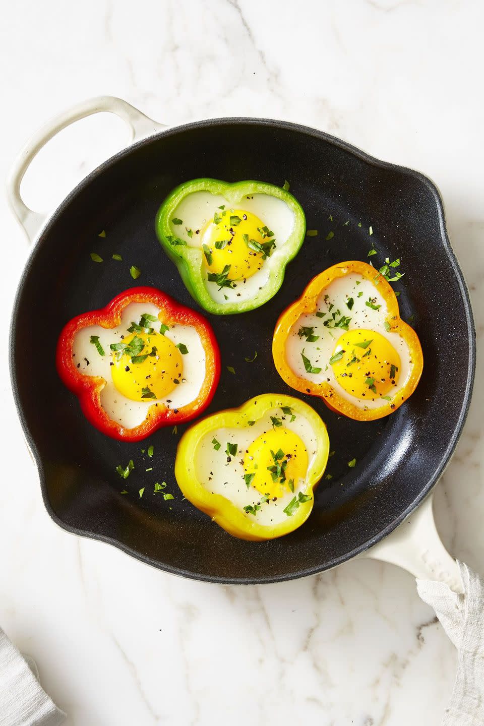 <p>This easy egg recipe is pleasing to the eye <em>and</em> packed with flavor. It's also a simple way to ensure Mom gets as many flowers as possible. </p><p><em><a href="https://www.goodhousekeeping.com/food-recipes/a42847/flower-power-sunny-side-eggs-recipe/" rel="nofollow noopener" target="_blank" data-ylk="slk:Get the recipe for Flower Power Sunny-Side Eggs »;elm:context_link;itc:0;sec:content-canvas" class="link ">Get the recipe for Flower Power Sunny-Side Eggs »</a></em> </p>