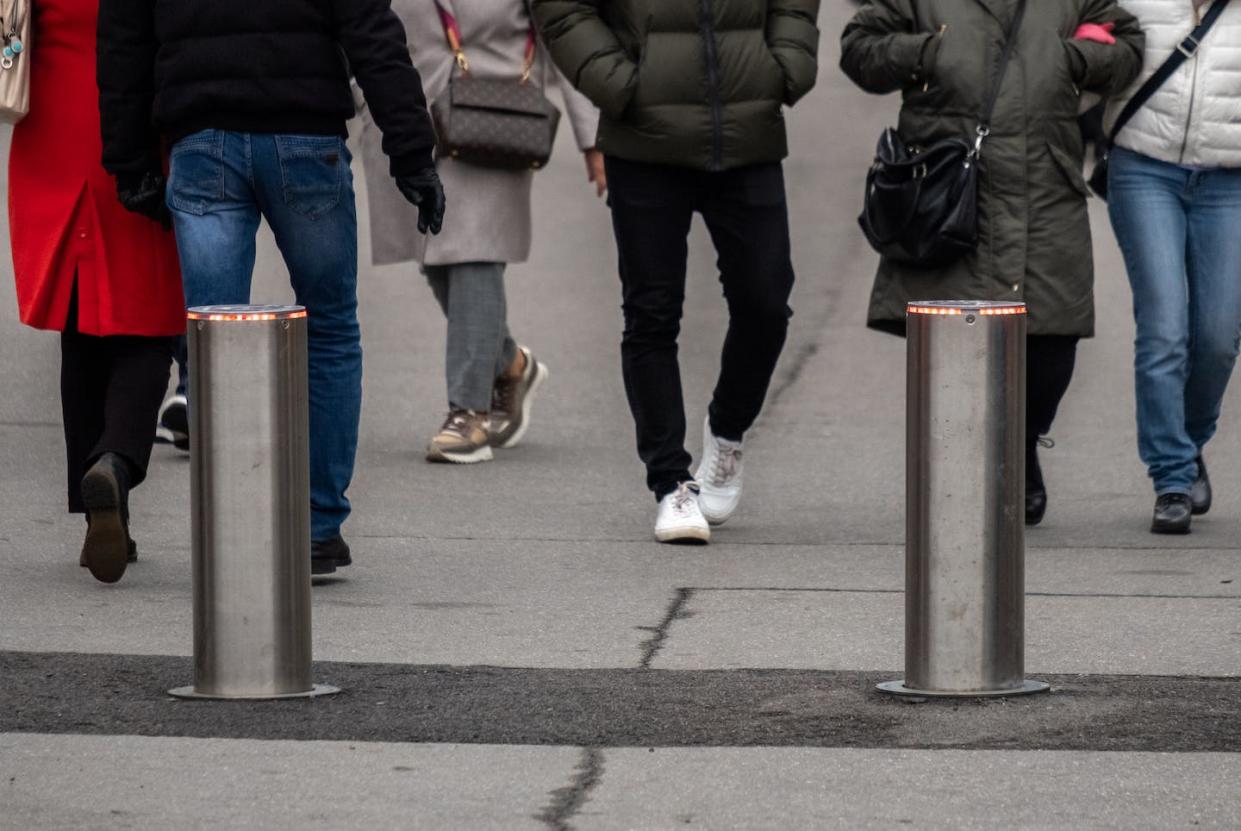 Retractable bollards can be used to signal priority areas on streets for smaller vehicles, cyclists and pedestrians. <a href="https://www.gettyimages.com/detail/photo/automatic-cylindrical-barriers-on-the-pedestrian-royalty-free-image/1185641332" rel="nofollow noopener" target="_blank" data-ylk="slk:Eugene Nekrasov/Getty images Plus;elm:context_link;itc:0;sec:content-canvas" class="link ">Eugene Nekrasov/Getty images Plus</a>