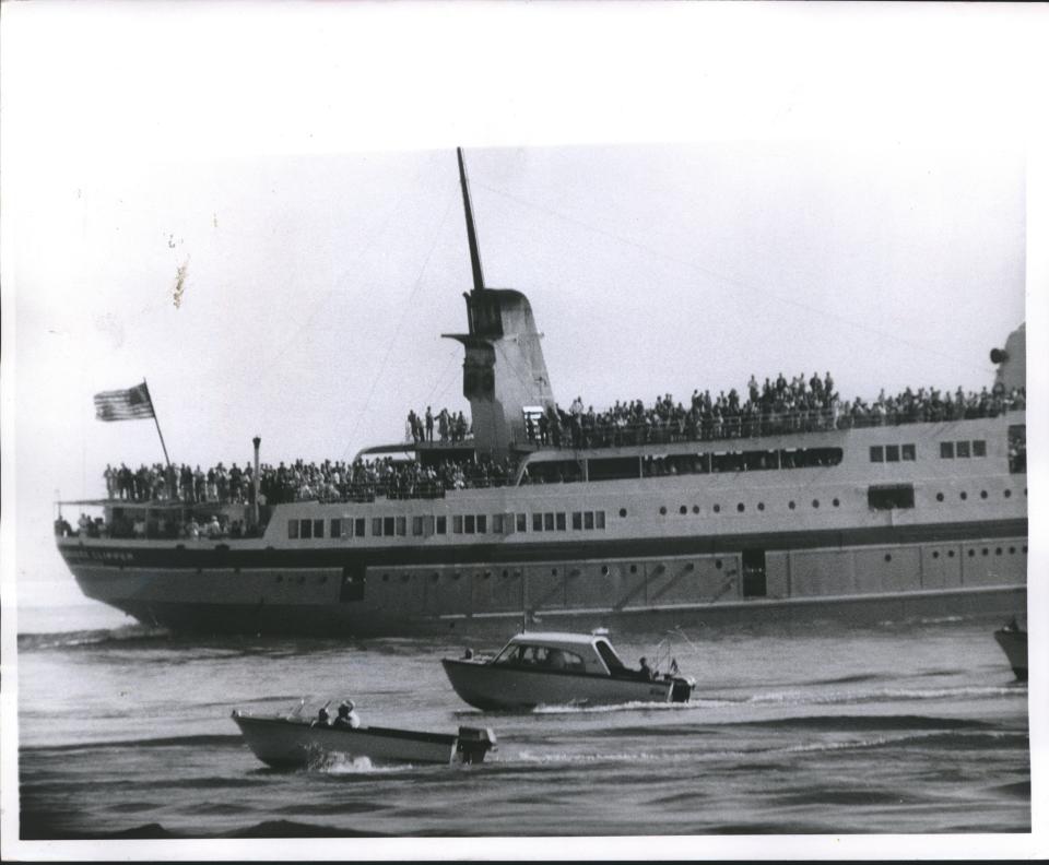 Passengers line the decks of the Milwaukee Clipper to get a view of Queen Elizabeth's yacht, the Britannia, when it sailed past Milwaukee on a trip across Lake Michigan on July 7, 1959.