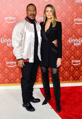 <p>Matt Winkelmeyer/Getty</p> Eddie Murphy and Paige Butcher at 'Candy Candy Lane' premiere