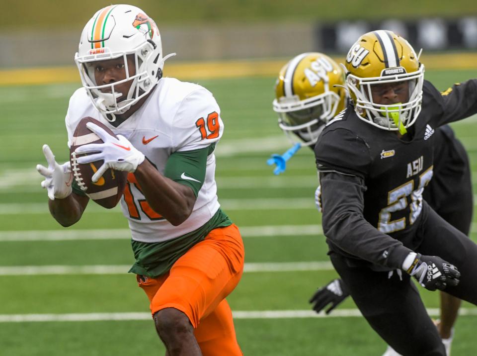 Florida A&M wide receiver Xavier Smith (19) makes a touchdown reception against Alabama State during their game at Hornet Stadium in Montgomery, Ala. on Saturday November 12, 2022.

Asu03