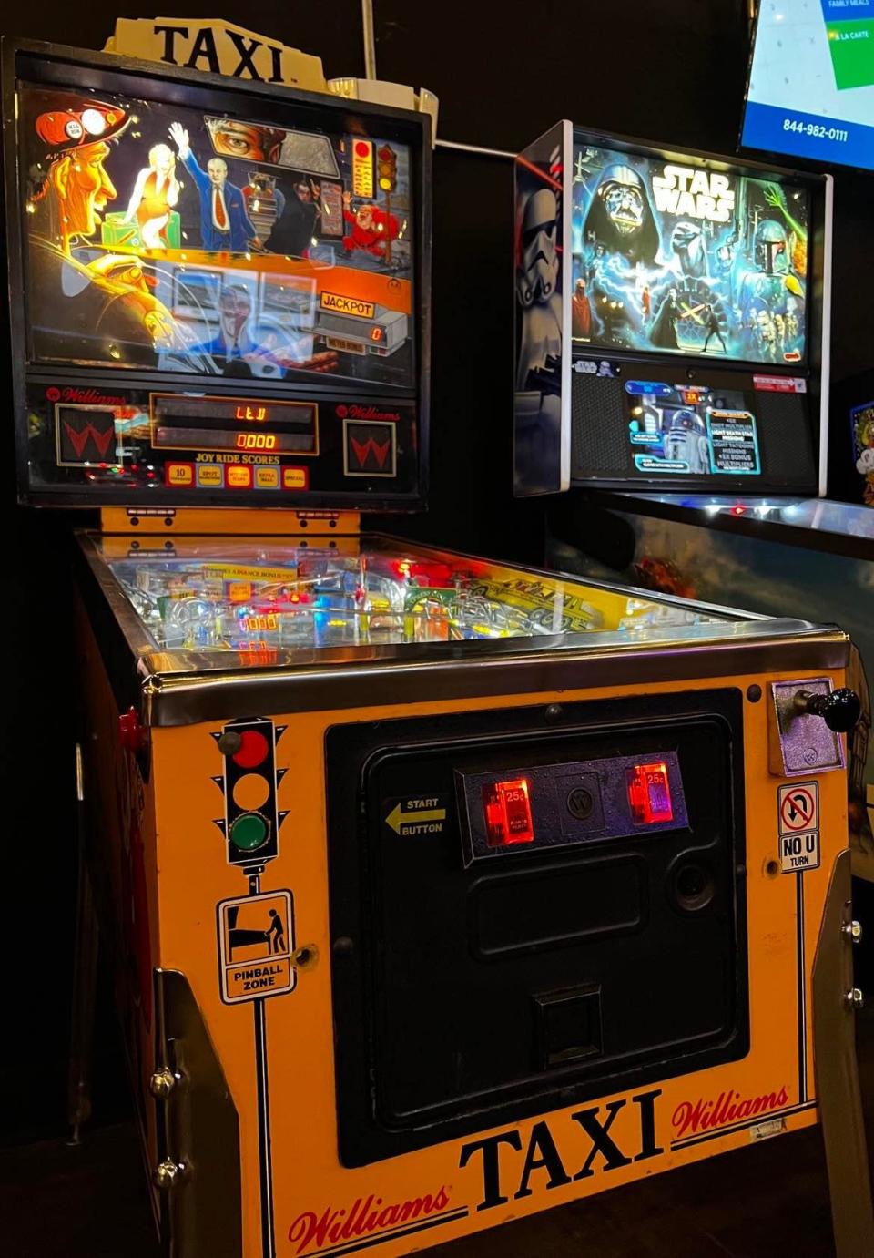 "Taxi" is among the pinball machines at the new arcade at Sandy Springs Brewery Co. in downtown Minerva.