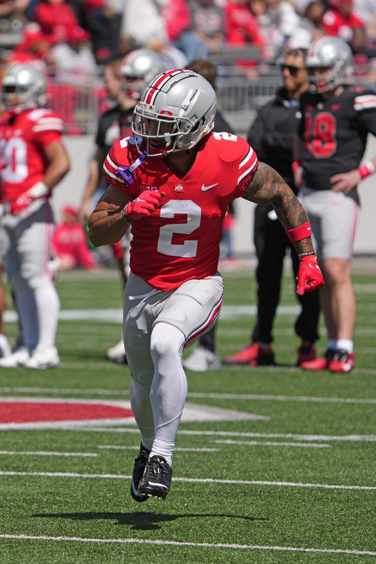 Apr 13, 2024; Columbus, OH, USA; Ohio State Buckeyes wide receiver Emeka Egbuka (2) or Ohio State Buckeyes safety Kurt Williams II (2) warming up before the start of the Ohio State football spring game at Ohio Stadium.