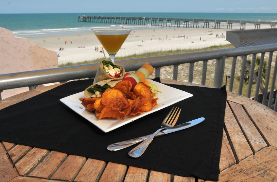 The view from the Penthouse Lounge at Casa Marina Hotel and Restaurant includes the Jacksonville Beach Pier.