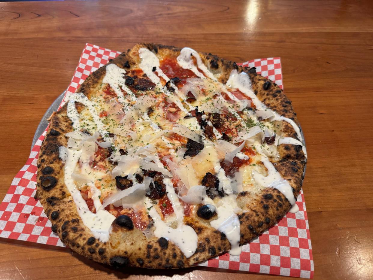 The chicken bacon pizza is in and out of the Ippa Pizza oven in 90 seconds.