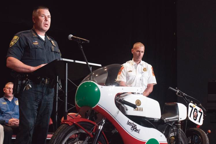 Laconia Police Chief Matt Canfield, left, speaks about safety as Fire Chief Tim Joubert looks on during a press conference ahead of the 101st Laconia Motorcycle Week at the Colonial Theatre in Laconia on Thursday morning.