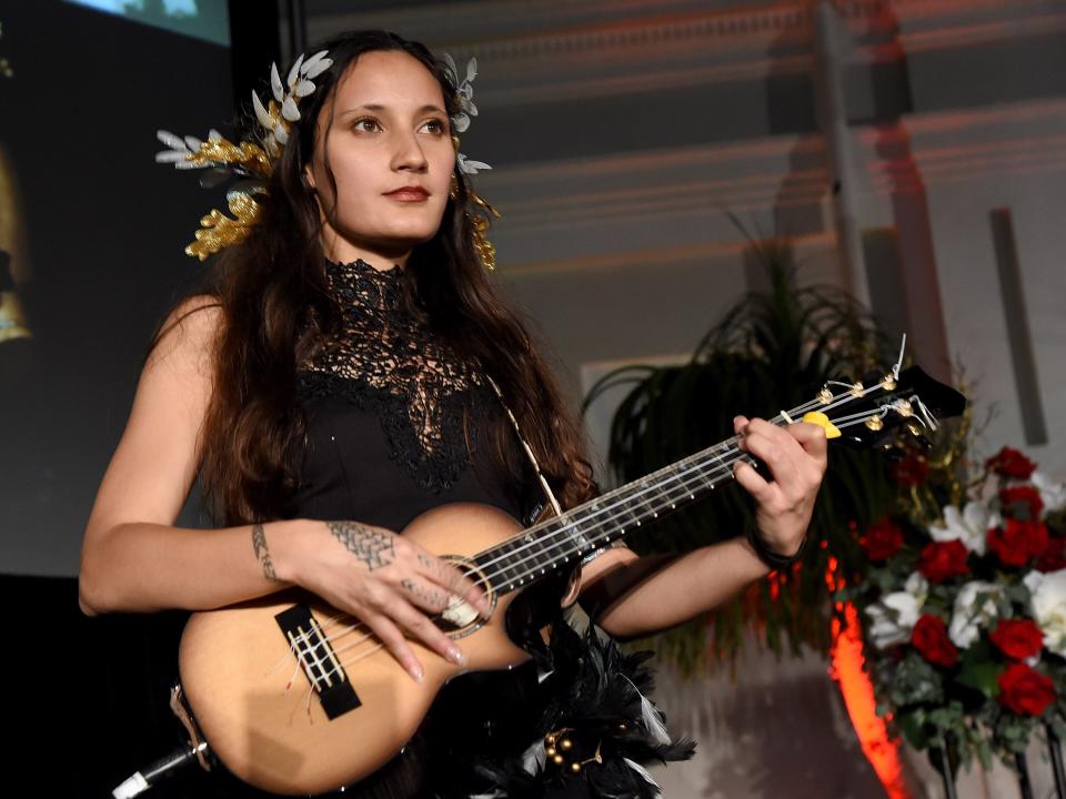 Taimane Gardner performing onstage at the 8th Annual Hawaii European Cinema Film Festival Gala in 2017.