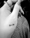 <p>Another matching tattoo Gomez has is an arrow on her left hand, which her friend and songwriting partner Julia Michaels also has. When Michaels and Gomez hold hands, the arrows point together, symbolising their friendship. </p>