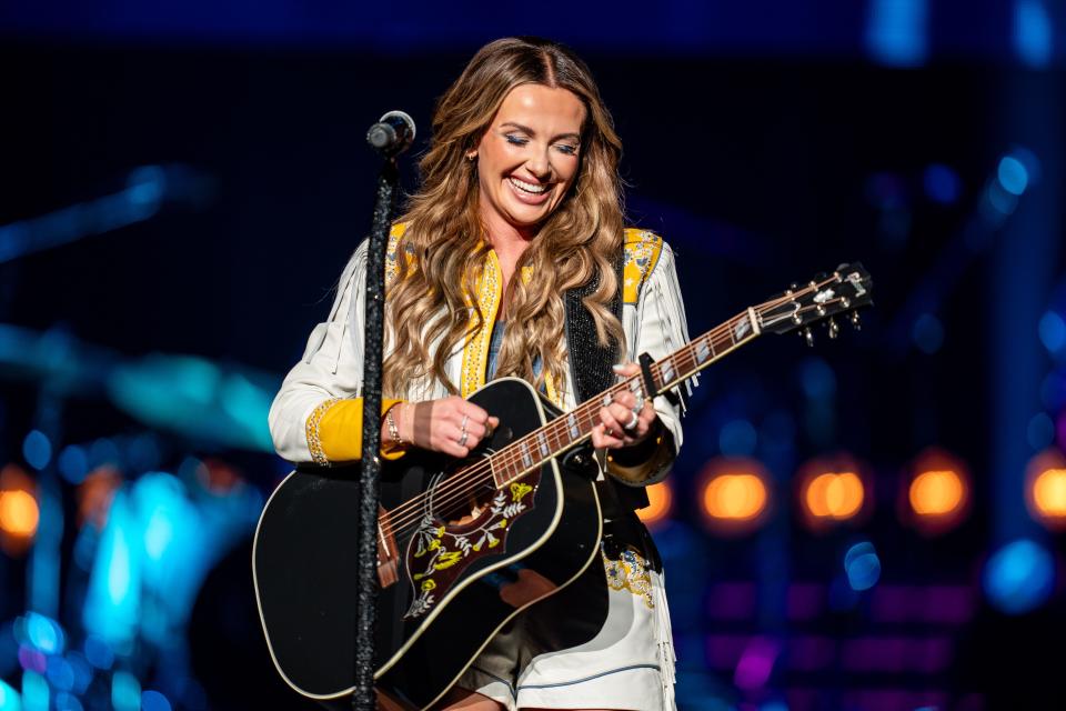 Carly Pearce performs, opening for Tim McGraw, during the Standing Room Only Tour concert at Bridgestone Arena in Nashville, Tenn., Thursday, April 25, 2024.