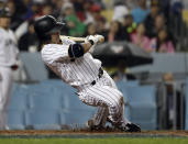 Japan's Norichika Aoki gets out of the way of a pitch during the eighth inning of a semifinal in the World Baseball Classic against the United States in Los Angeles, Tuesday, March 21, 2017. (AP Photo/Chris Carlson)