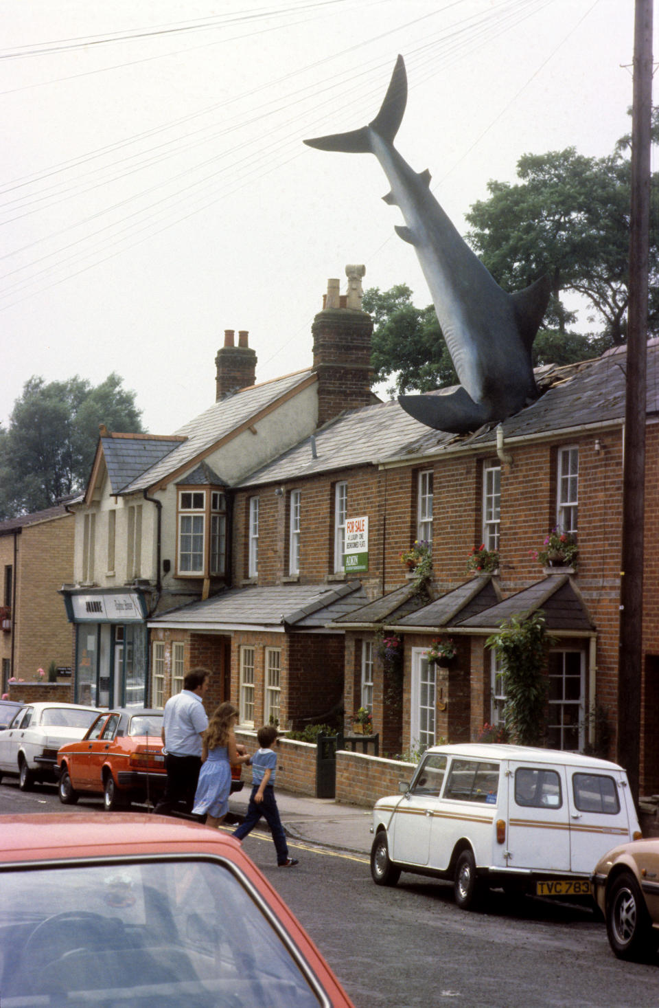 EDITORIAL USE ONLY: A MASSIVE SHARK APPEARS TO HAVE NOSE-DIVED INTO A PRETTY ROW OF TERRACED COTTAGES AT HEADINGTON, OXFORDSHIRE.