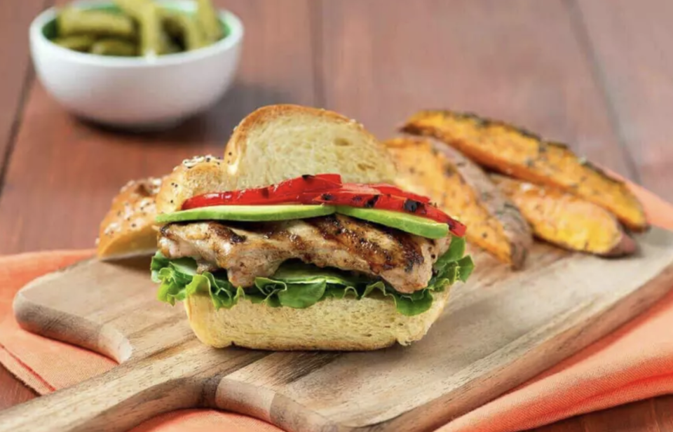 <p>There are countless variations on a chicken sandwich, and this one with sesame oil and ginger is bursting with Asian flavors. If you like things spicy, you’ll love the sprinkling of red pepper flakes. </p> <p><a href="https://www.thedailymeal.com/recipe/asian-grilled-chicken-sandwich?referrer=yahoo&category=beauty_food&include_utm=1&utm_medium=referral&utm_source=yahoo&utm_campaign=feed" rel="nofollow noopener" target="_blank" data-ylk="slk:For the Asian Grilled Chicken Sandwich recipe, click here.;elm:context_link;itc:0;sec:content-canvas" class="link ">For the Asian Grilled Chicken Sandwich recipe, click here. </a></p>