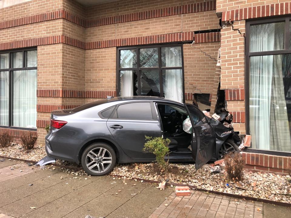 A car LMPD said was stolen crashed Thursday morning into a downtown Louisville building after a chase. March 23, 2023