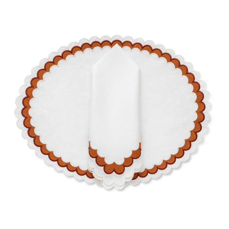 <p>cecebarfieldinc.com</p><p><strong>$475.00</strong></p><p>These scalloped dinner napkins are the perfect pairing for your pumpkin-filled centerpieces. Plus, they come in array of colors that will pair with any fresh-from-the-garden arrangement.</p>