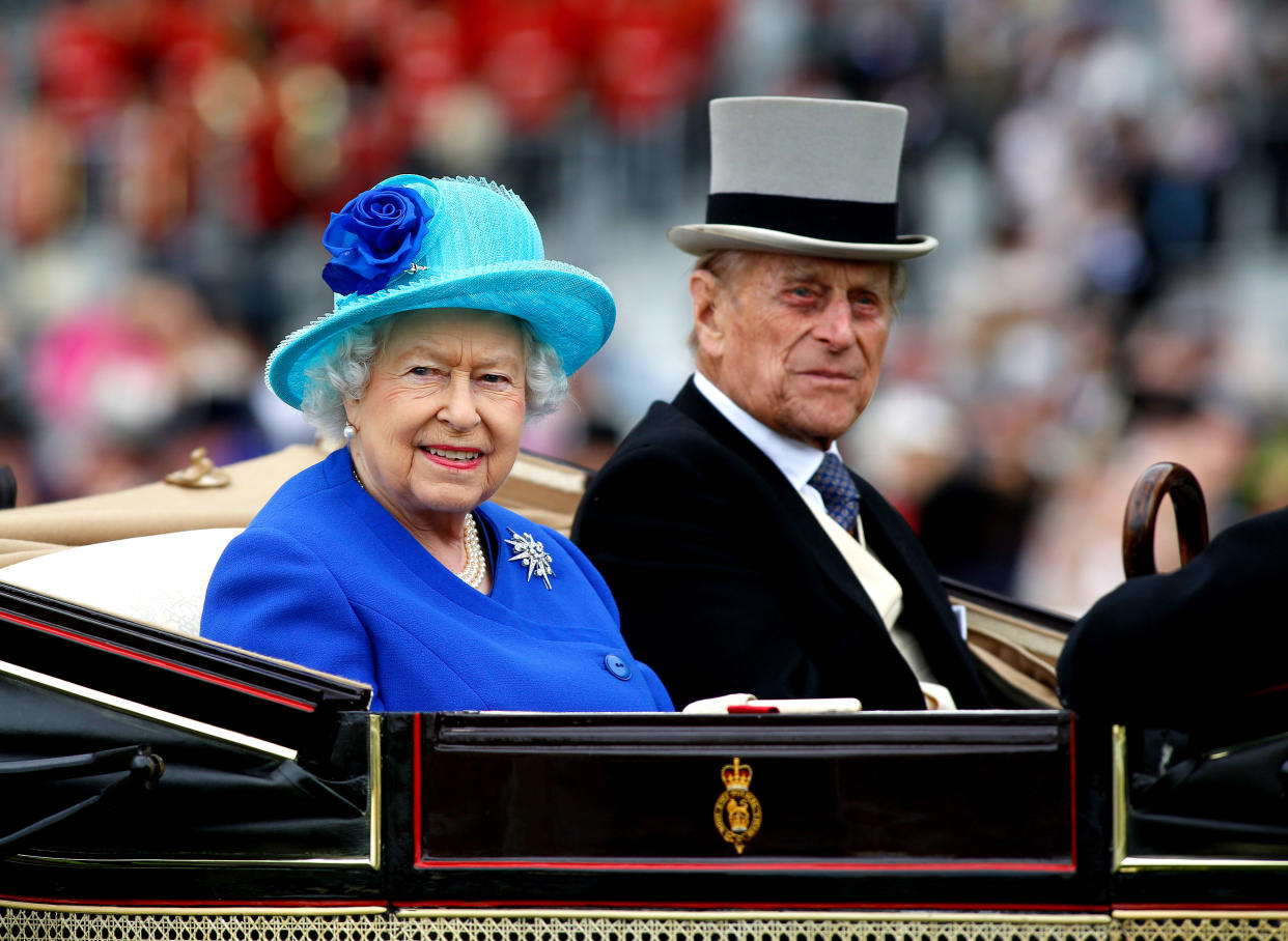 ASCOT, ENGLAND - JUNE 18: Queen Isabel II and Prince Philip, Duke of Edinburgh take part in the carriage procession during Day Five of Royal Ascot at Ascot Racecourse on June 18, 2016 in Ascot, England. (Photo by Julian Herbert/Getty Images)