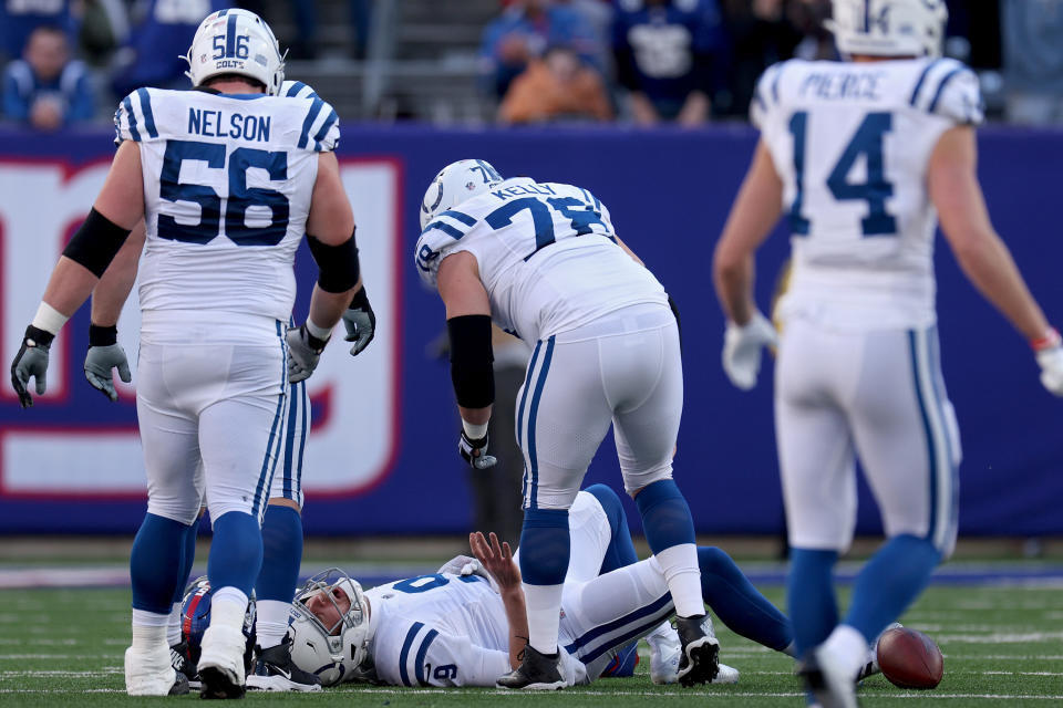 EAST RUTHERFORD, NEW JERSEY - JANUARY 01: Nick Foles #9 of the Indianapolis Colts is injured against the New York Giants during the second quarter at MetLife Stadium on January 01, 2023 in East Rutherford, New Jersey. (Photo by Jamie Squire/Getty Images)