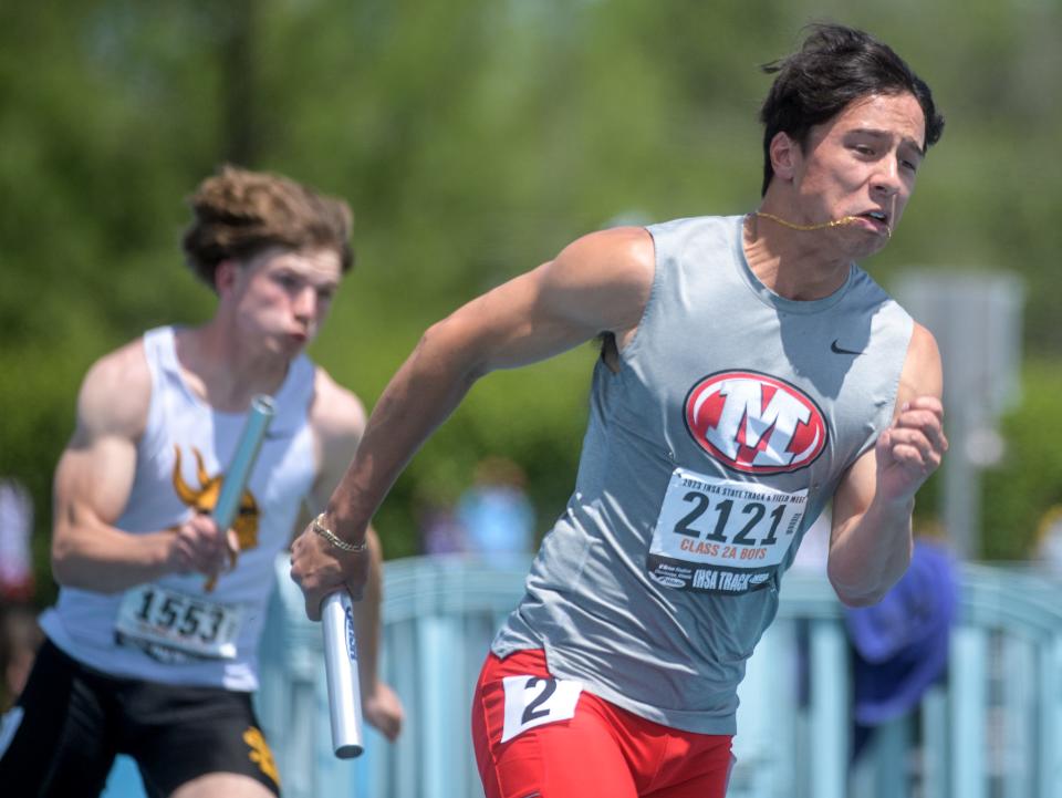 Morton's Micah Wong sprints out of the blocks with his baton in his hand and his chain in his mouth during the Class 2A state 4X100-meter relay Saturday, May 27, 2023 at Eastern Illinois University in Charleston. The Potters finished fifth in the event.