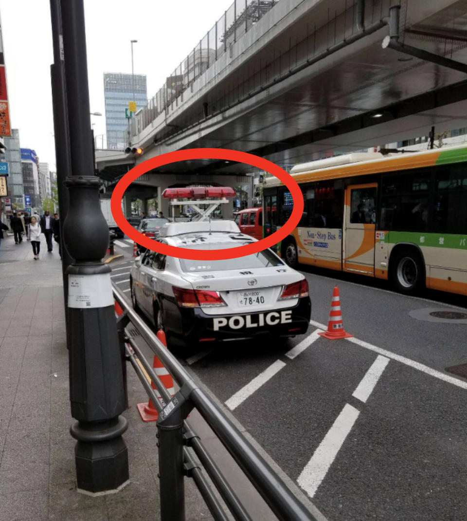 The police lights are built on top of a small hydraulic lift that can raise the lights much higher than the car when activated