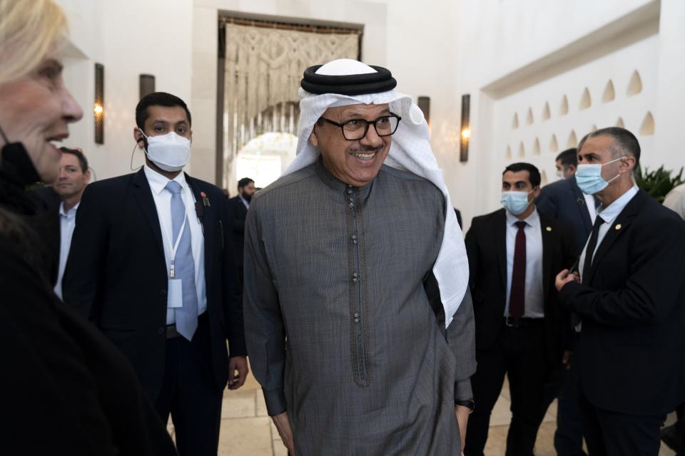 After meeting for the Negev Summit, Bahrain's Foreign Minister Abdullatif bin Rashid al-Zayani, center, greets attendees of the summit, Monday, March 28, 2022, in Sde Boker, Israel. (AP Photo/Jacquelyn Martin, Pool)