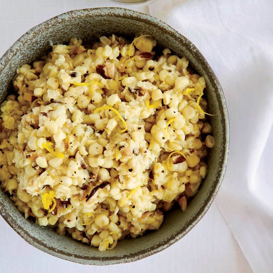 <p>“My granny taught me that when corn is very fresh, the juices are naturally creamy,” Kevin Gillespie says. “I took that as the gospel.” He grates half of the corn here to make a luxurious puree that thickens without cream.</p> <p><strong>Kevin’s Tip:</strong> Scraping corn cobs with the dull side of a knife removes the juices.</p><p><a href="https://www.foodandwine.com/recipes/creamless-creamed-corn-with-mushrooms-and-lemon" rel="nofollow noopener" target="_blank" data-ylk="slk:GO TO RECIPE;elm:context_link;itc:0;sec:content-canvas" class="link ">GO TO RECIPE</a></p>