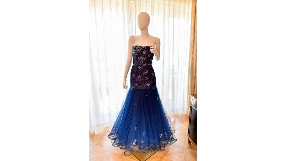 Princess Diana's 1986 midnight-blue Murray Arbeid dress, is on display at Julien's Auctions' press preview of "Princess Diana's Elegance & a Royal Collection", ahead of an exclusive private showing at the Peninsula Beverly Hills, Beverly Hills, California, June 25, 2024