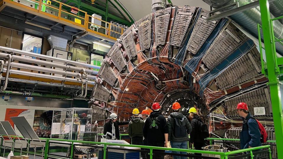 Vistors look at equipment at Cern