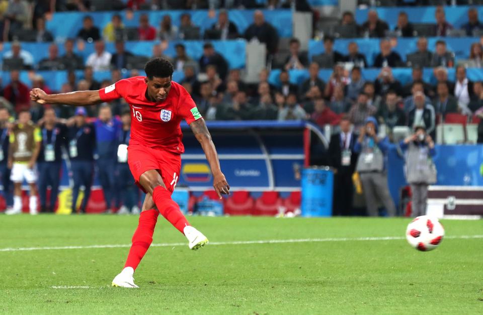 <p>Marcus Rashford fires home his penalty</p>Getty Images