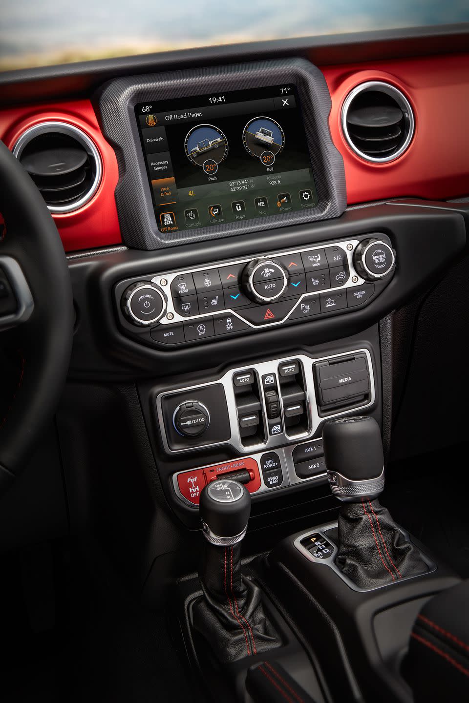 <p>Inside, the Gladiator is a mix of modern design and necessary function, including a waterproof start button for when you forget your truck is a roadster.</p>