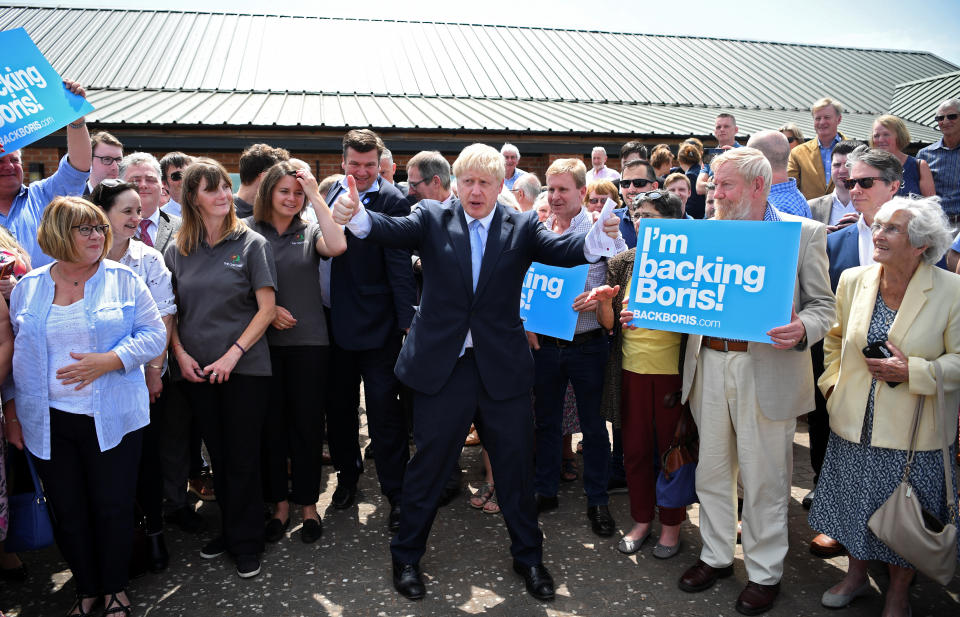 Conservative party leadership contender Boris Johnson thumbs up as he leaves an event after addressing party members at the Oaktree Arena in Highbridge, Somerset.