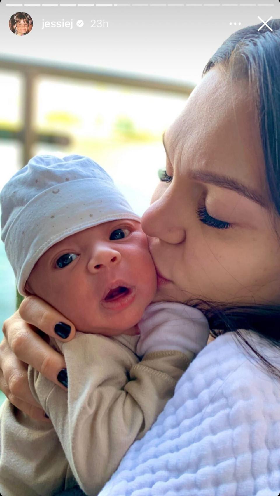 Jessie J plants a kiss on her newborn son Sky’s cheek (Instagram/Jessie J)