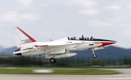 A T-50 advanced jet trainer takes off during training at the First Fighter Wing of the South Korean air force in Gwangju, south of Seoul, in this August 14, 2013 file photo. REUTERS/Lee Jae-Won/Files