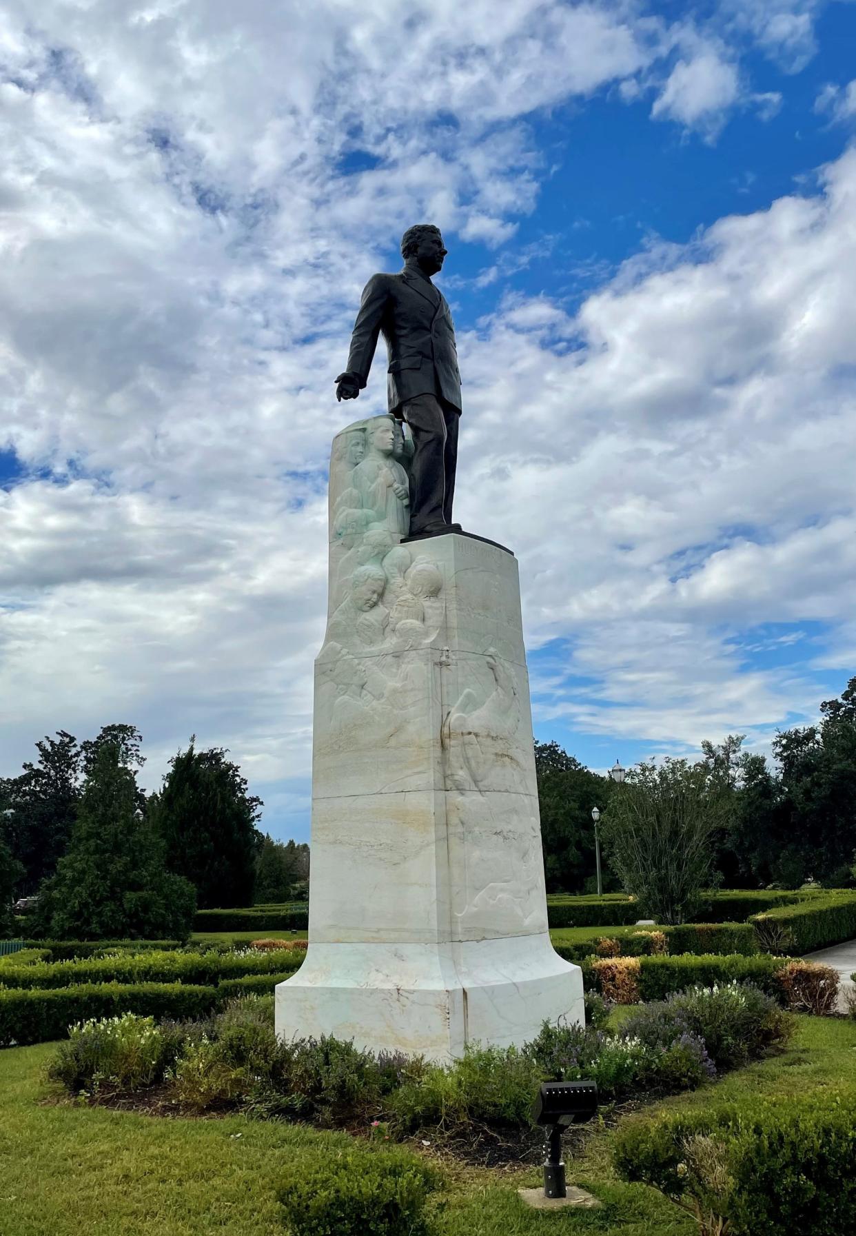 Former Gov. Huey Long looks overlooks the Louisiana Capitol that he built from his towering statue that is also his tombstone on Nov. 11, 2021.