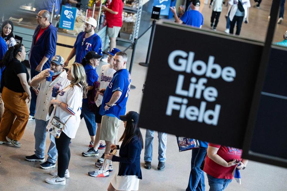 Texas Rangers fans enter the stadium for the 2024 season opener between the Rangers and the Chicago Cubs at Globe Life Field in Arlington on Thursday, March 28, 2024. Chris Torres/ctorres@star-telegram.com