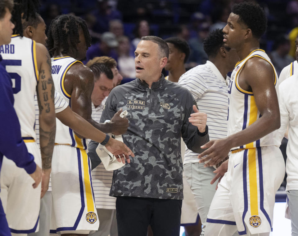 LSU coach Matt McMahon talks with players on the court during a timeout during an NCAA college basketball game against Nicholls on Friday, Nov. 10, 2023, in Baton Rouge, La. (Hilary Scheinuk/The Advocate via AP)