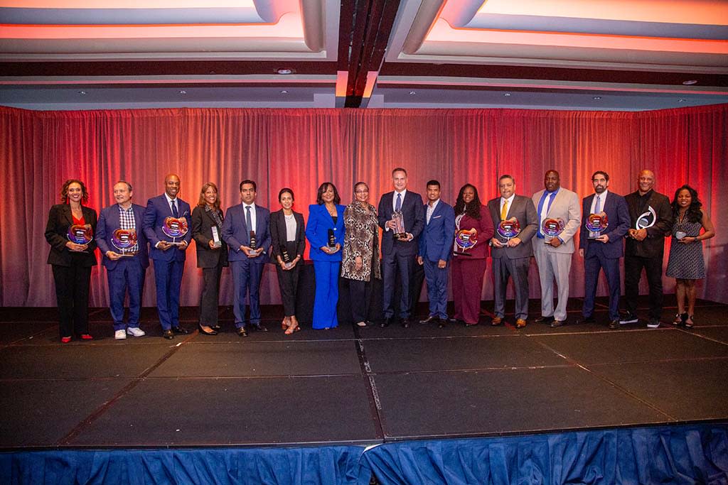  2023 NAMIC Annual Awards recipients were honored at the conference (l. to r.): Heather Anderson, ESPN; Kevin Martinez, ESPN; Marcus Best, Allied Global Marketing; Catherine Mitchell, Cox; Puru Patnekar, Charter; Chara-Lynn Aguiar, ESPN; Valerie Spiller, A+E; Shuanise Washington, president and CEO, NAMIC; Jose Diaz-Balart, the 2023 NAMIC Mickey Leland Humanitarian Achievement Award recipient; Emory Walton, NAMIC board chair; DeAdria Wright-Davis, Mark Leon Guerrero, LaRawn Robinson and Trent Taylor, Charter; Mark Walker, ESPN; and Monique Manners, NAMIC-Florida chapter president. 