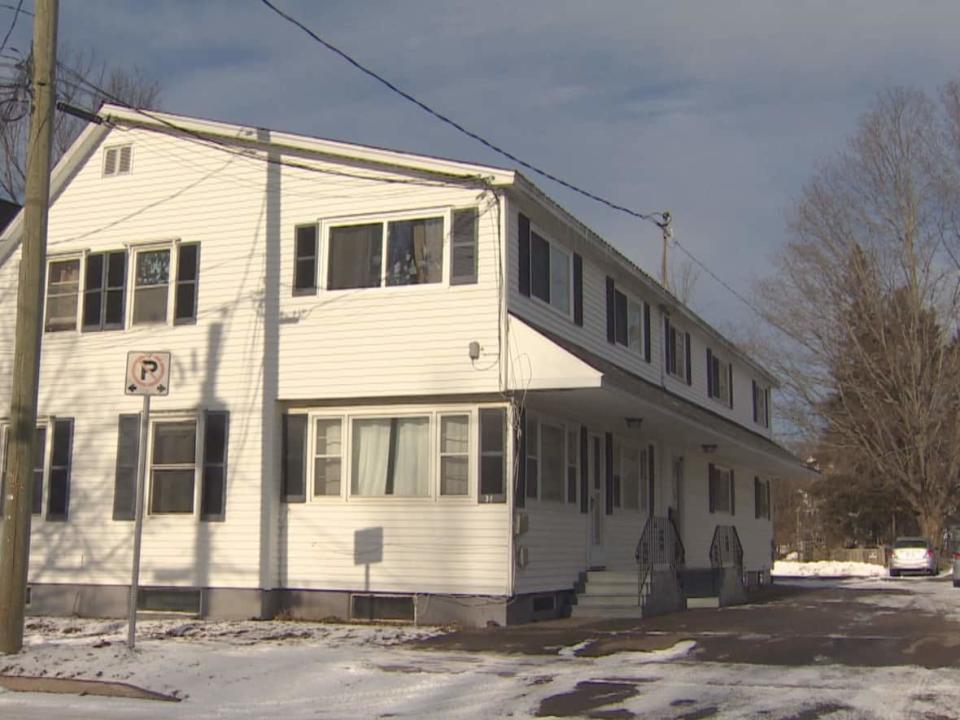 This 7 unit apartment building on Fredericton's Shore Street was bought earlier this month for $775,000.   Tenants received rent increase notices of between 40 and 67.5 per cent almost immediately. (Ed Hunter/CBC News - image credit)