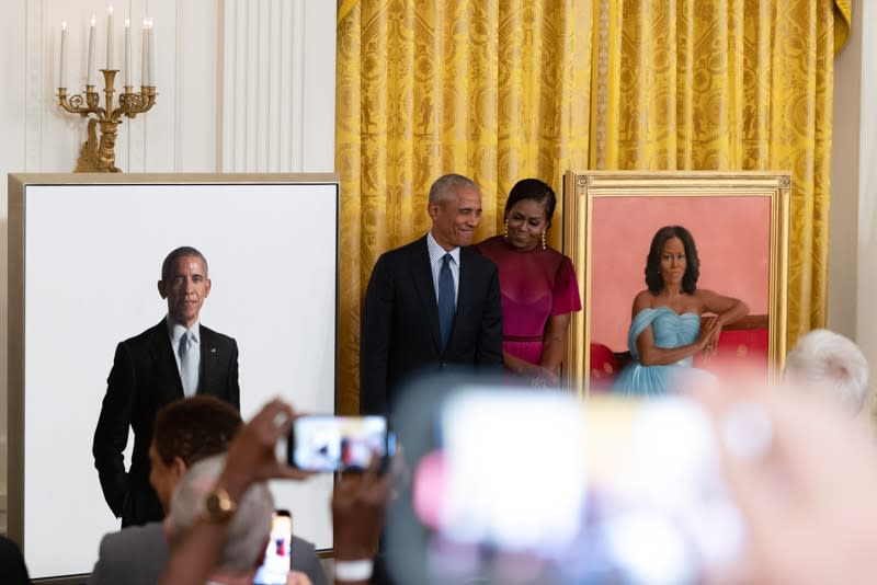 Former President Barack Obama and former first lady Michelle Obama unveil their official White House portraits. (Photo: Cheriss May for theGrio)