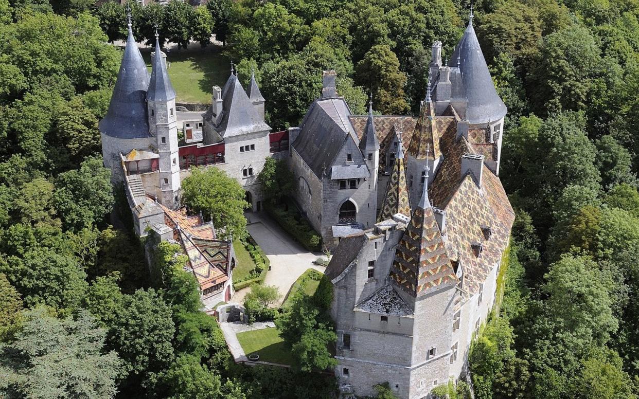 Gendarmes seized €4.6 million (£4m) of jewels and property, including a medieval castle identified as Chateau de la Rochepot in the wine growing Côte d’Or - Photolibrary.com