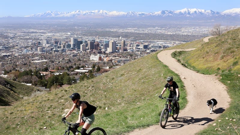 Mountain bikers ride along the Bonneville Shoreline trail in Salt Lake City on Thursday, April 11, 2024.